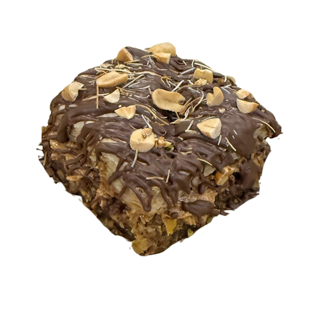 Peanut Butter Dubai baklava — milk chocolate, peanuts and kataifi over walnut baklava