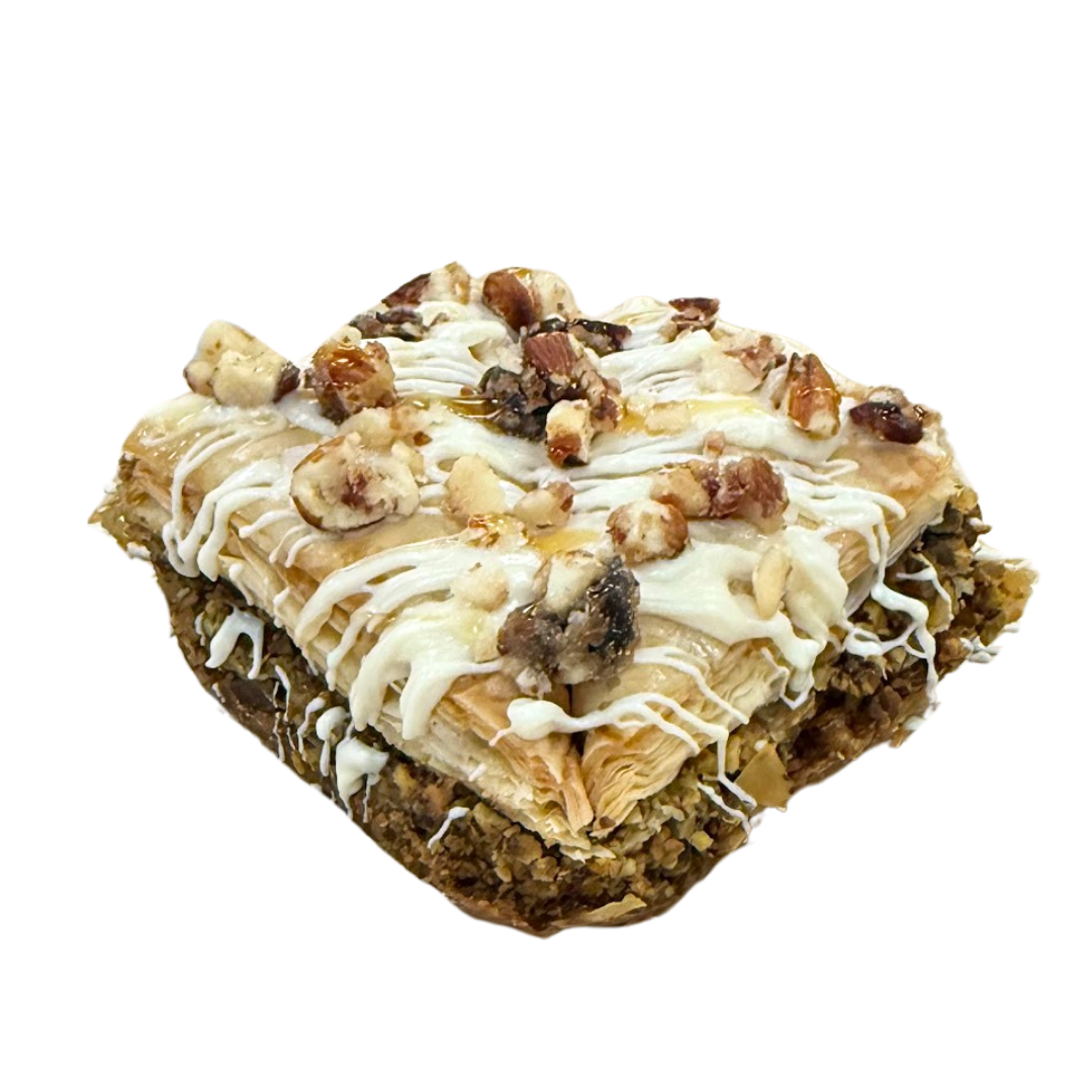 Apricot Macadamia baklava — white chocolate, macadamia clusters and honey over walnut baklava